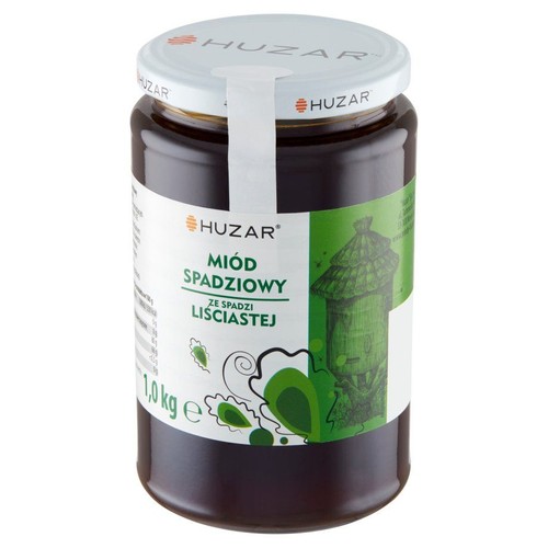 Słoik miodu spadziowego Huzar, 1,0 kg. Biała etykieta z zielonym tłem i grafiką ula. Biała zakrętka z logo Huzar.