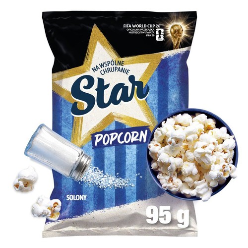 Opakowanie Star Popcorn Solony 95g. Na nim złota gwiazda. Obok miska popcornu.