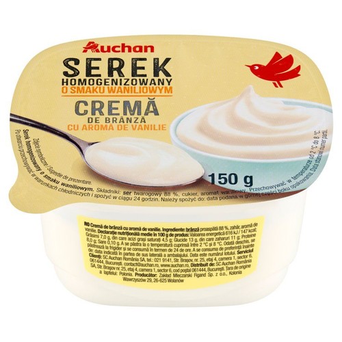 Auchan Serek Homogenizowany o smaku waniliowym, 150 g. Na żółtym wieczku grafika serka w miseczce i na łyżce.