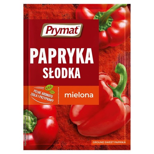 Prymat Papryka Słodka mielona w czerwonym opakowaniu. Na opakowaniu grafika czerwonych papryk i proszku.