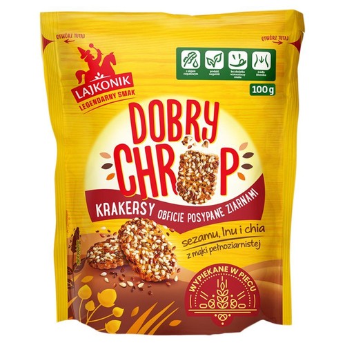 Żółte opakowanie krakersów Lajkonik Dobry Chrup, 100g. Na etykiecie widoczne są krakersy z ziarnami sezamu, lnu i chia. Produkt z mąki pełnoziarnistej, wegański, z olejem rzepakowym, bez dodatku wzmacniaczy smaku. Wypiekane w piecu.