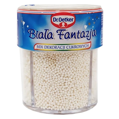 Opakowanie Dr. Oetker Biała Fantazja, mix białych dekoracji cukrowych. Przezroczysty pojemnik z białymi perełkami i innymi posypkami.