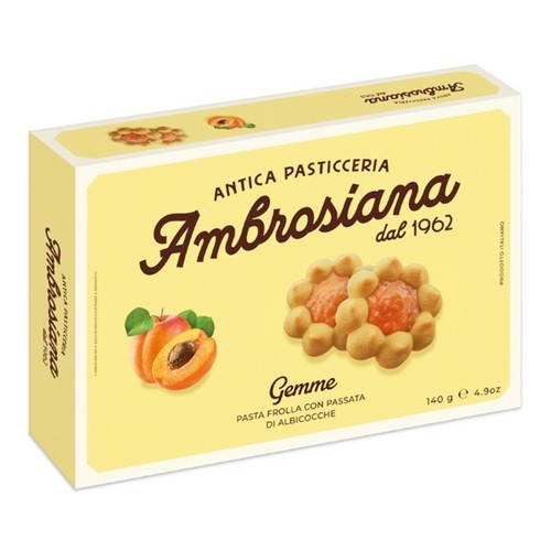 Żółte pudełko ciastek Antica Pasticceria Ambrosiana Gemme. Zawiera kruche ciastka z dżemem morelowym. Na opakowaniu widoczna ilustracja świeżych moreli oraz dwóch okrągłych ciastek z nadzieniem. 