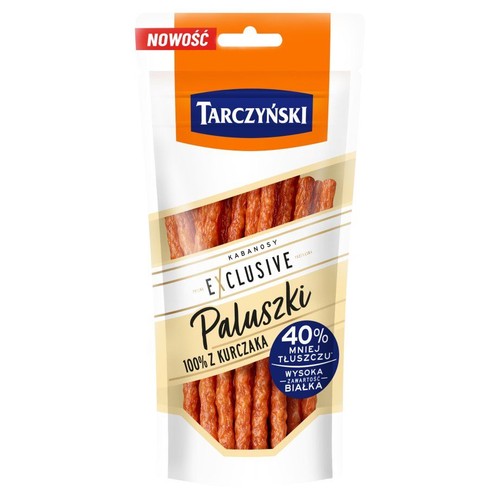 Kabanosy Tarczyński Exclusive Paluszki 100% z kurczaka w białym opakowaniu. Oznaczone jako nowość, z mniejszą zawartością tłuszczu.