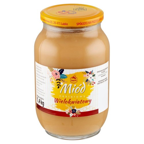 Słoik miodu nektarowego wielokwiatowego Apis o masie netto 1,4 kg. Produkt w szklanym opakowaniu z żółtą zakrętką. Etykieta zawiera nazwę "Miód nektarowy Wielokwiatowy" oraz grafikę z różowymi i czerwonymi kwiatami.