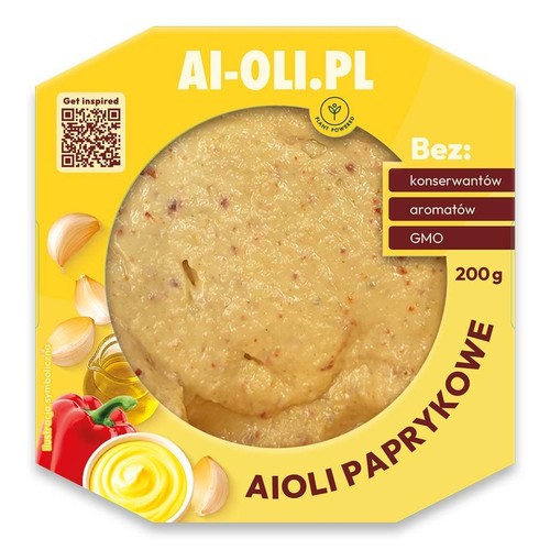 Żółte opakowanie Aioli Paprykowego AI-OLI.PL o wadze 200g. W centralnym okręgu widoczne jest paprykowe aioli. Produkt jest roślinny, bez konserwantów, aromatów i GMO. Na opakowaniu grafiki czosnku i papryki.