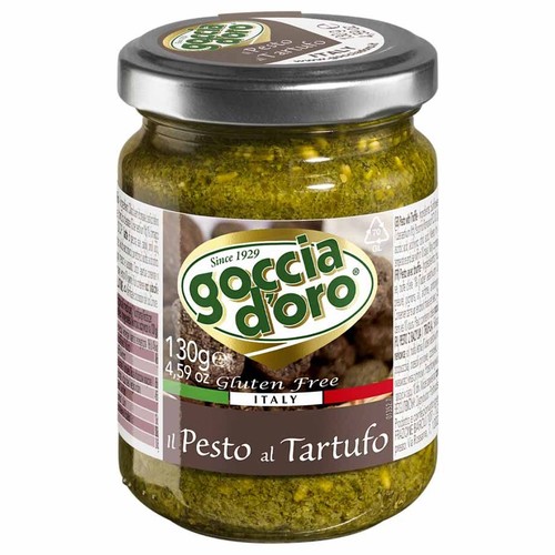 Zielone pesto truflowe Goccia d'oro w słoiku z metalową zakrętką. Waga netto 130g. Na etykiecie widnieje logo firmy, informacja o bezglutenowości oraz pochodzeniu z Włoch.