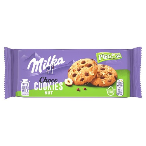 Fioletowe opakowanie Milka Pieguski Choco Cookies Nut. Grafika przedstawia dwa ciasteczka z kawałkami czekolady i orzechów laskowych.