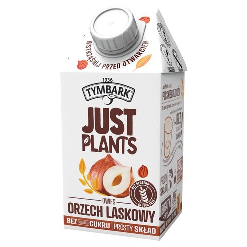 Karton napoju roślinnego Tymbark Just Plants Owies Orzech Laskowy. Na froncie grafika orzechów laskowych. Produkt bez glutenu, bez dodatku cukru, wegański. Z napisem "Prosty skład".