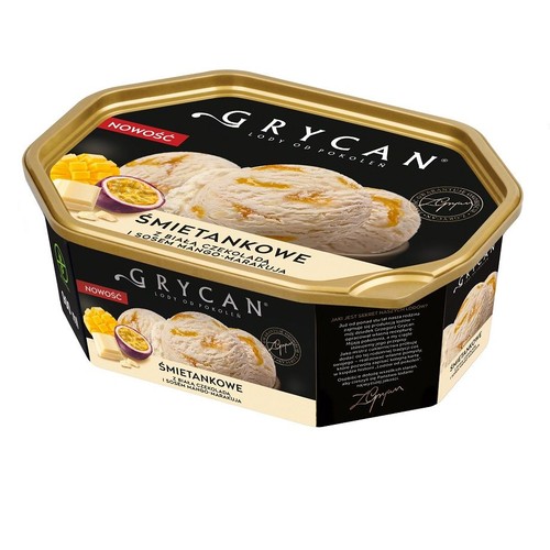 Lody Grycan śmietankowe z białą czekoladą i sosem mango-marakuja w czarnym, sześciokątnym opakowaniu ze złotą pokrywką. Na etykiecie grafika przedstawiająca gałki lodów, kawałki mango, białą czekoladę i przekrojoną marakuję.