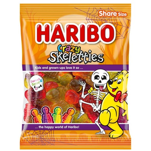 Żelki Haribo Crazy Skeletties w dużej, pomarańczowej torebce z napisem "Share Size". Produkt zawiera słodko-kwaśne żelki w kształcie szkieletów i czaszek. Na opakowaniu widoczny jest miś Haribo i wesoły szkielet.