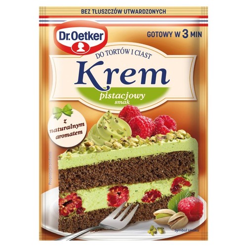 Dr. Oetker Krem pistacjowy do tortów i ciast. Na opakowaniu grafika tortu czekoladowego z zielonym kremem, malinami i pistacjami.