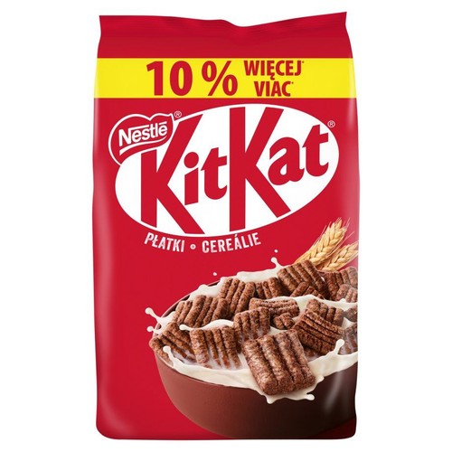 Opakowanie płatków KitKat Cereal od Nestle, w kolorze czerwonym. Widoczna miska z czekoladowymi płatkami w mleku. Oferta 10% więcej.