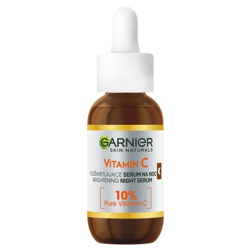 Serum rozświetlające Garnier Skin Naturals Vitamin C na noc w brązowej butelce z białą pipetą. Na etykiecie widnieje nazwa produktu oraz informacja o 10% zawartości czystej witaminy C.