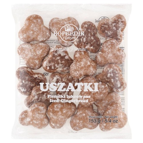 Pierniki Kopernik Uszatki, lukrowane, w przezroczystym opakowaniu, masa netto 153 g.