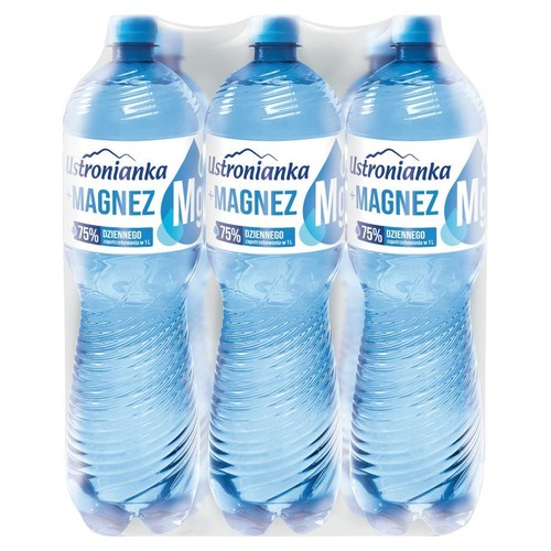 Trójpak wody Ustronianka Magnez w plastikowych butelkach o pojemności 1 litra każda. Butelki są przezroczyste, z niebieskimi zakrętkami. Na etykiecie widnieje nazwa produktu i informacja, że 1 litr wody pokrywa 75% dziennego zapotrzebowania na magnez.