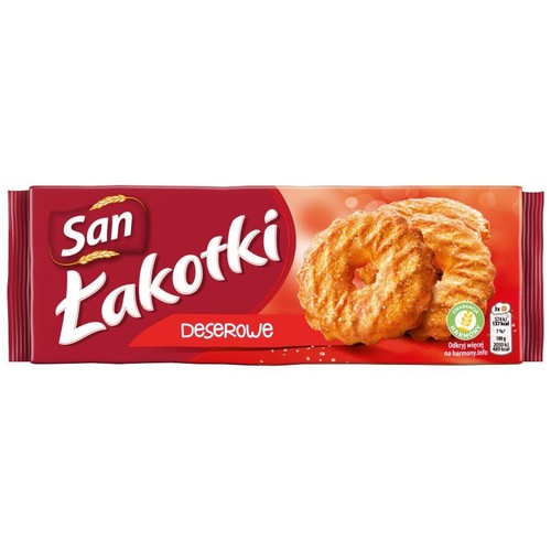 San Łakotki Deserowe, 180g. Czerwono-pomarańczowe opakowanie z wizerunkiem dwóch okrągłych ciastek z posypką.