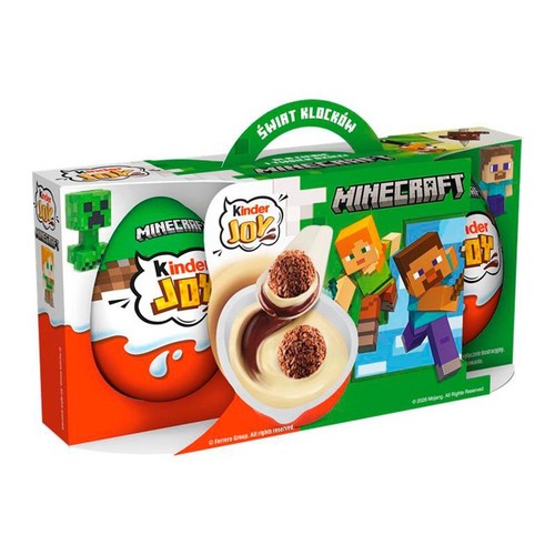 Pudełko Kinder Joy w specjalnej edycji Minecraft. Opakowanie jest zielono-białe, z dużym logo Minecraft i grafikami popularnych postaci z gry, takich jak Steve, Alex i Creeper. Widoczna ilustracja otwartego jajka Kinder Joy.