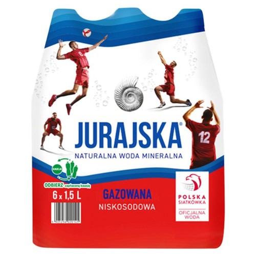 Zgrzewka Jurajskiej Naturalnej Wody Mineralnej Gazowanej Niskosodowej, zawierająca 6 butelek po 1.5 litra, co daje łącznie 9 litrów. Etykieta przedstawia dynamiczne grafiki siatkarzy w czerwonych strojach oraz spiralną muszlę.
