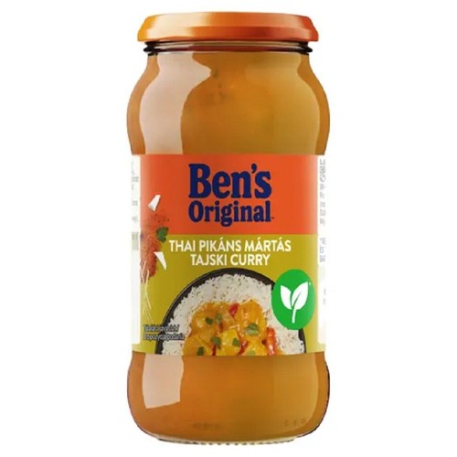 Szklany słoik sosu Ben's Original Tajskie Curry. Na pomarańczowo-żółtej etykiecie widnieje nazwa marki, tekst "Tajski Pikantny Sos" oraz "Tajskie Curry". Poniżej grafika miski białego ryżu z kawałkami w sosie curry. Widoczne zielone logo wegetariańskie.