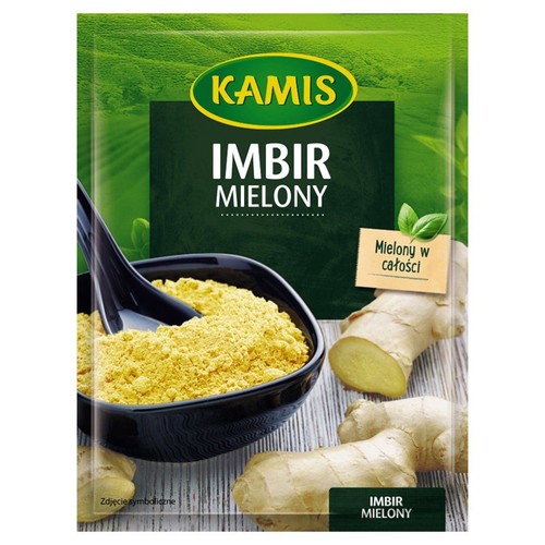 Produkt Kamis Imbir Mielony w zielonej torebce. Na opakowaniu znajduje się ilustracja żółtego, mielonego imbiru w czarnej misce z łyżką oraz świeżych korzeni imbiru. Informacja "Mielony w całości" jest widoczna. To jest zdjęcie symboliczne.