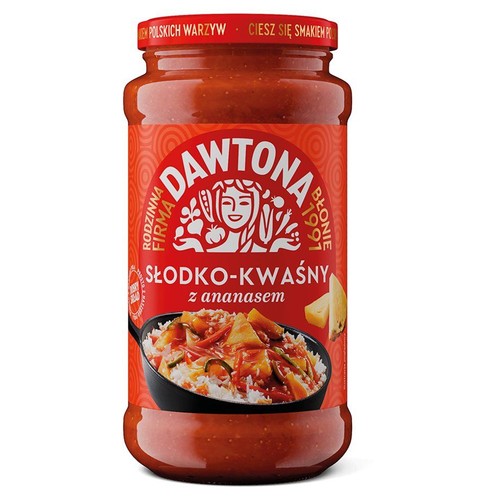 Słoik sosu Dawtona Słodko-Kwaśny z ananasem. Czerwona etykieta z logo firmy i nazwą produktu. Na etykiecie znajduje się również ilustracja gotowego dania z ryżem, sosem słodko-kwaśnym, kawałkami ananasa i warzywami.