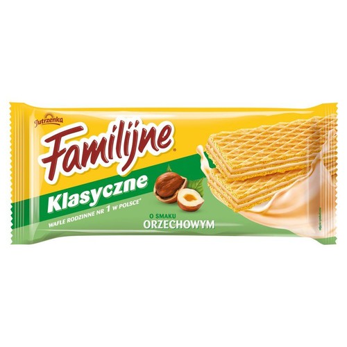 Opakowanie wafli Jutrzenka Familijne Klasyczne o smaku orzechowym. Żółto-zielona folia z grafiką wafli i orzechów laskowych.