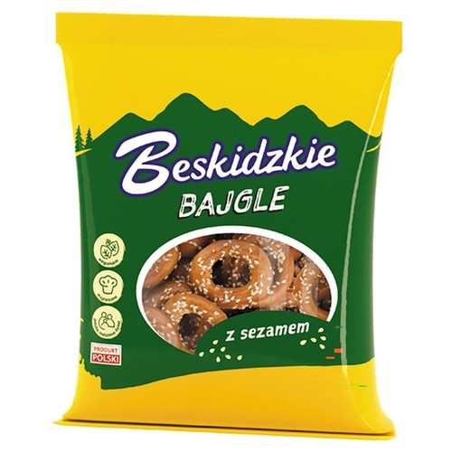 Opakowanie Beskidzkich Bajgli z sezamem. Zielono-żółta paczka z okienkiem, przez które widać złociste, okrągłe bajgle. Wegańskie, wypiekane.