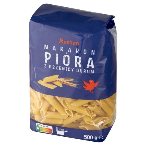 Opakowanie makaronu pióra Auchan z pszenicy durum, 500g. Widoczne złote rurki i kłosy zboża na etykiecie.