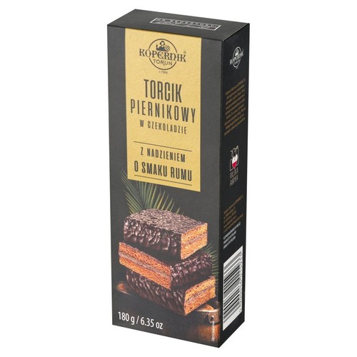 Opakowanie Kopernik Toruń Torcik Piernikowy w Czekoladzie z Nadzieniem o Smaku Rumu, 180g. Na grafice przekrojone ciastka.