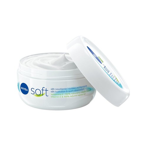 Krem Nivea Soft w białym, okrągłym słoiku. Pokrywka jest uchylona, ukazując białą, gęstą konsystencję kremu. Produkt zapewnia 48 godzin nawilżenia i zawiera witaminę E oraz naturalny olejek jojoba.