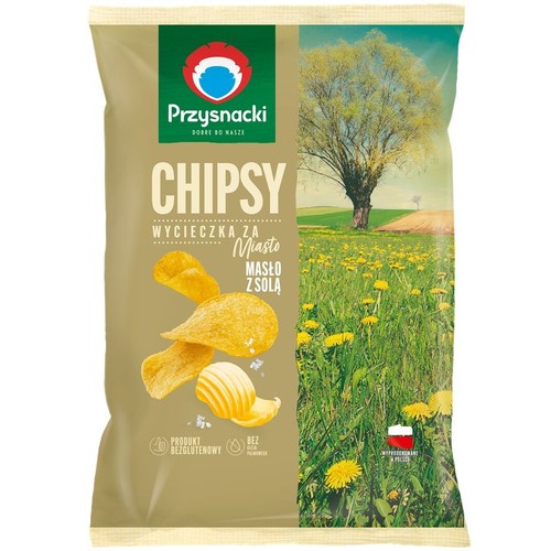 Chipsy Przysnacki "Wycieczka za Miasto" o smaku masła z solą. Opakowanie z grafiką pola i mniszków. Bezglutenowe.