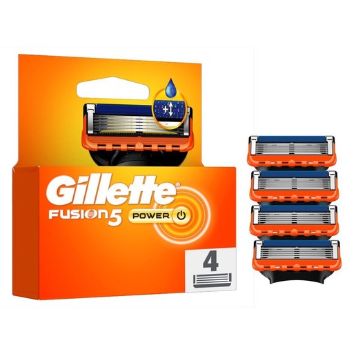 Zestaw 4 wymiennych ostrzy Gillette Fusion 5 Power w pomarańczowym opakowaniu. Obok leżą cztery ostrza.