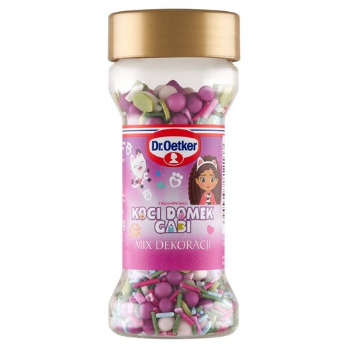 Dr. Oetker Koci Domek Gabi Mix Dekoracji w przezroczystym pojemniku z złotą nakrętką. Zawiera kolorowe posypki i kuleczki.