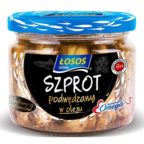 Słoik szprotów podwędzanych w oleju marki Łosoś Ustka. Na etykiecie informacja o naturalnym wędzeniu i Omega-3.