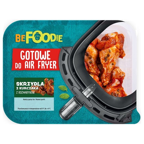 BEFOODIE Skrzydła z kurczaka z rozmarynem, gotowe do frytkownicy beztłuszczowej. Widoczne surowe skrzydełka w marynacie.