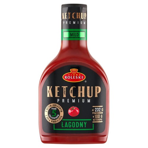 Ketchup Roleski Premium Łagodny w charakterystycznej czerwonej butelce z czarną zakrętką. Etykieta podkreśla, że produkt ma tylko 5 składników, w tym ocet jabłkowy i sól himalajską. W 100g ketchupu jest aż 232g pomidorów.
