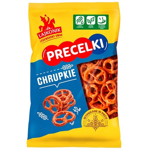 Żółto-niebieskie opakowanie Lajkonik Precelki Chrupkie. Na froncie logo Lajkonika, nazwa produktu i okienko z widocznymi, brązowymi precelkami. Produkt wegański, wypiekany w piecu, bez dodatku wzmacniaczy smaku.