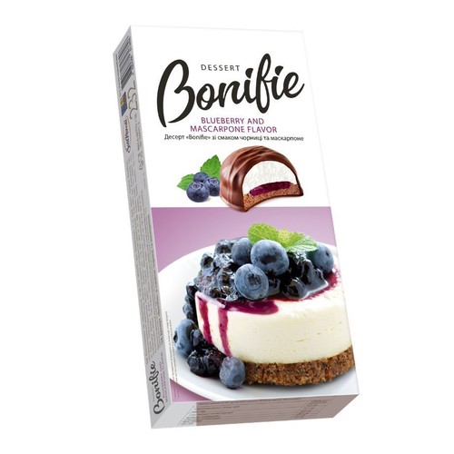 Opakowanie deseru Bonifie z grafiką sernika z borówkami i czekoladowego przysmaku z nadzieniem borówkowym i mascarpone.