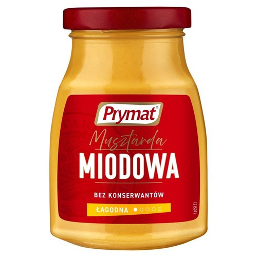 Musztarda miodowa Prymat w szklanym słoiku z czerwoną zakrętką. Etykieta informuje o braku konserwantów.