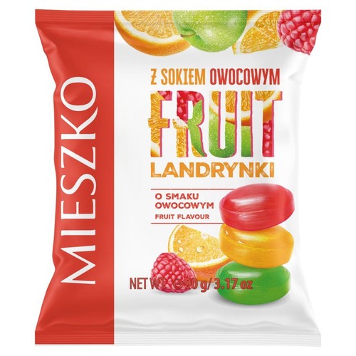 Torebka landrynek Mieszko Fruit, 90 gramów. Produkt o smaku owocowym, z sokiem owocowym. Na opakowaniu grafiki owoców: pomarańczy, jabłka i malin, oraz trzy błyszczące landrynki w kolorach czerwonym, żółtym i zielonym, ułożone jedna na drugiej.