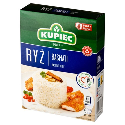 Kartonowe opakowanie ryżu basmati Kupiec, waga netto 300g (3x100g). Na froncie zdjęcie ugotowanego ryżu z cynamonem, kurczakiem i pomidorami. Produkt Polskiej Marki, Wysokiej Jakości.