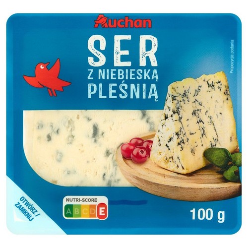 Ser z niebieską pleśnią Auchan w niebieskim opakowaniu 100 g. Na etykiecie czerwony ptak i napis "Otwórz/Zamknij".