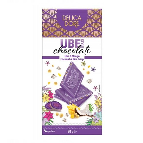 Czekolada Delica Dore Ube Style, 90g. Na opakowaniu grafika fioletowych tabliczek czekolady, kawałków ube, mango, kokosa i chrupek ryżowych. Nazwa "Ube & Mango Coconut & Rice Crisp".
