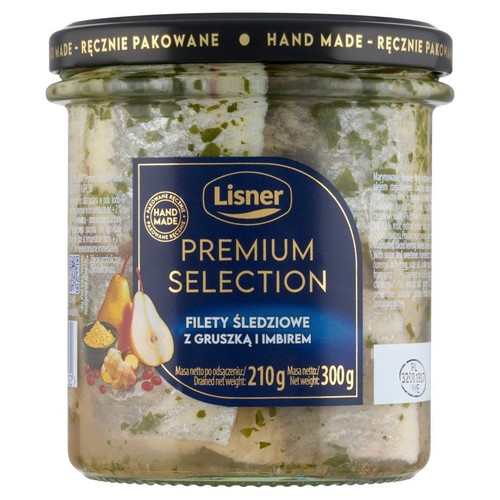 Lisner Premium Selection, filety śledziowe z gruszką i imbirem w przezroczystym słoiku z czarną zakrętką. Etykieta z grafiką gruszki i imbiru. Produkt oznaczony jako ręcznie pakowany. Masa netto 300g, masa po odsączeniu 210g.