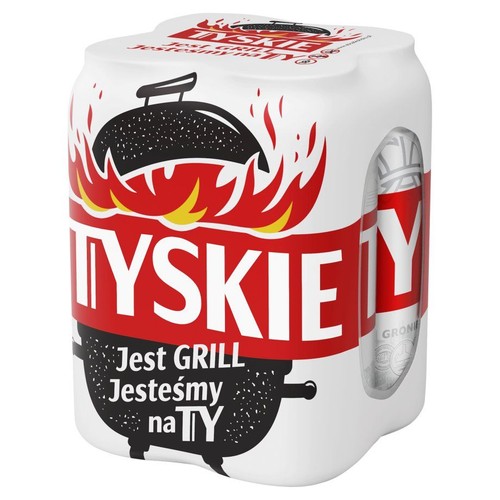 Czteropak piwa Tyskie w białym, kartonowym opakowaniu. Na opakowaniu dominuje czerwony napis "TYSKIE" oraz ilustracja czarnego grilla z intensywnymi płomieniami. Pod spodem hasło reklamowe "Jest GRILL Jesteśmy na TY".