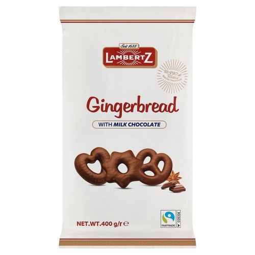 Opakowanie Lambertz Pierniki z czekoladą mleczną, 400g. Produkt od 1688 roku, z 990-letnią tradycją wypieku. Na białym tle pierniki w polewie czekoladowej w kształcie serca, okrągłym i precla. Widoczne logo Kakao Fairtrade.