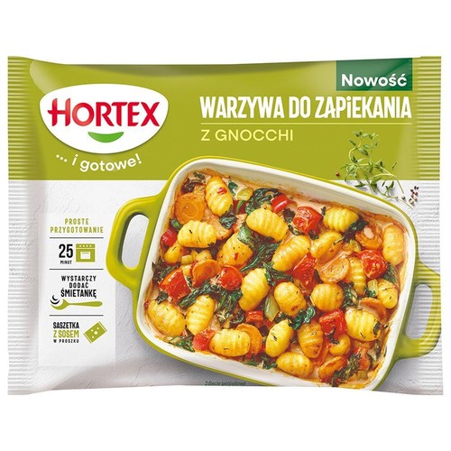 Hortex Warzywa do zapiekania z gnocchi. Nowość. Danie z gnocchi, warzywami i sosem w zielonym naczyniu. Gotowe w 25 minut.
