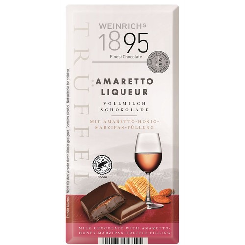 Opakowanie czekolady mlecznej Weinrichs 1895 Amaretto Liqueur z nadzieniem amaretto, miodowo-marcepanowym. Na opakowaniu widoczne dwa kawałki czekolady, jeden przekrojony, oraz kieliszek z płynem, plaster miodu i migdały.