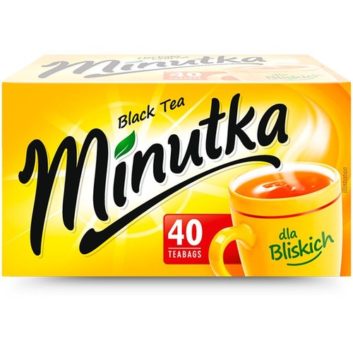 Pudełko czarnej herbaty Minutka, 40 torebek. Żółte opakowanie z ilustracją kubka herbaty.